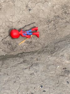 Abandoned Spiderman Toy outside of Asylum Seeker Camp near river